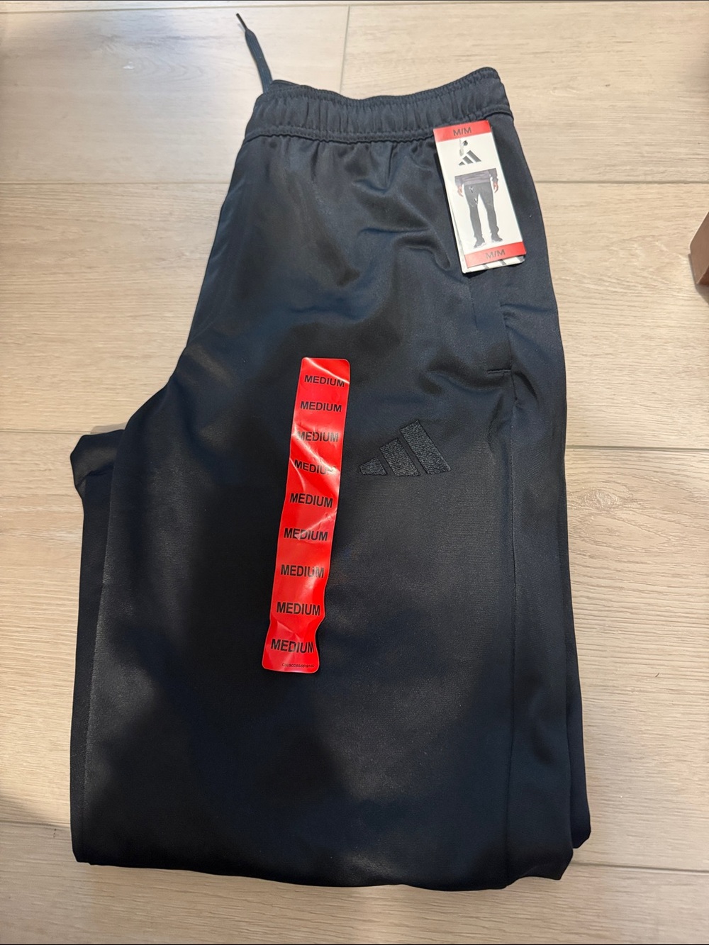 adidas Black Men’s Athletic Joggers with Subtle Logo and Zipper pockets